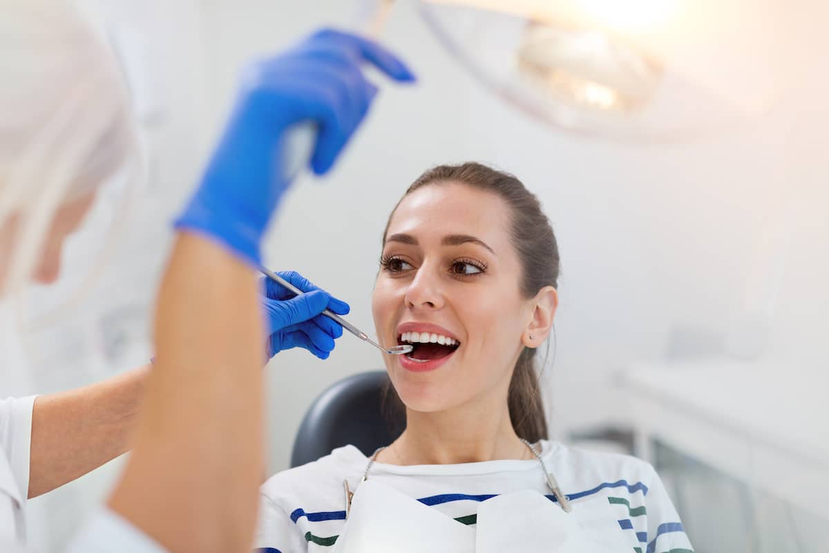 Woman at dentist check up preventive dentistry